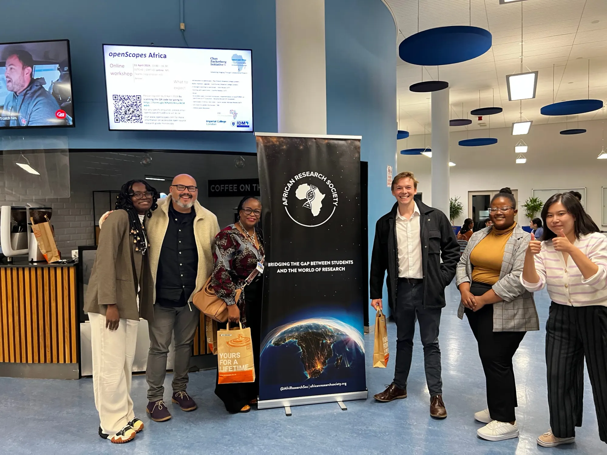 ARS team beside the society banner at a microscopy workshop with UCT partners